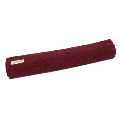 red fabric yoga mat